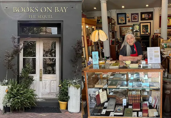 The Books on Bay – The Sequel storefront on Abercorn Street beside the glass book counter inside, in Savannah, GA